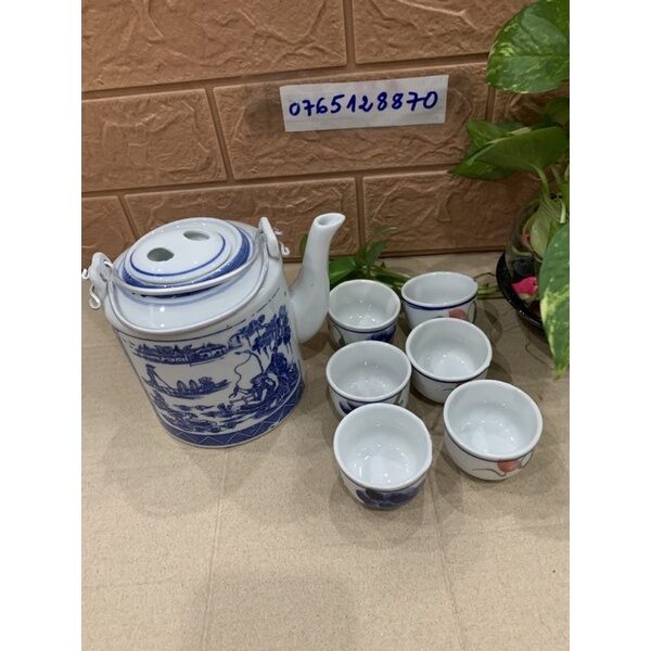 Bộ bình trà kèm 6 tách bằng sứ 800ml ( hoa văn ngẫu nhiên)