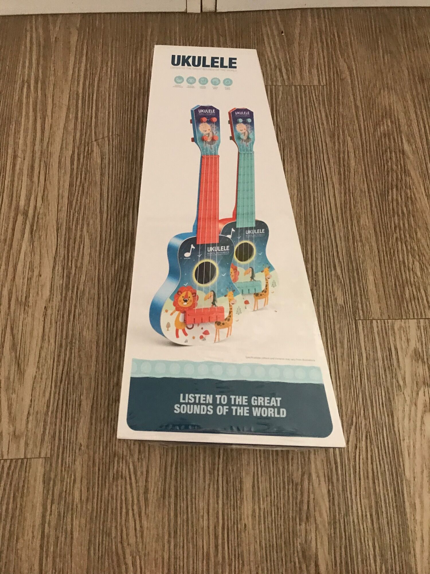 Đàn ukulele mini cho bé quà tặng huggies