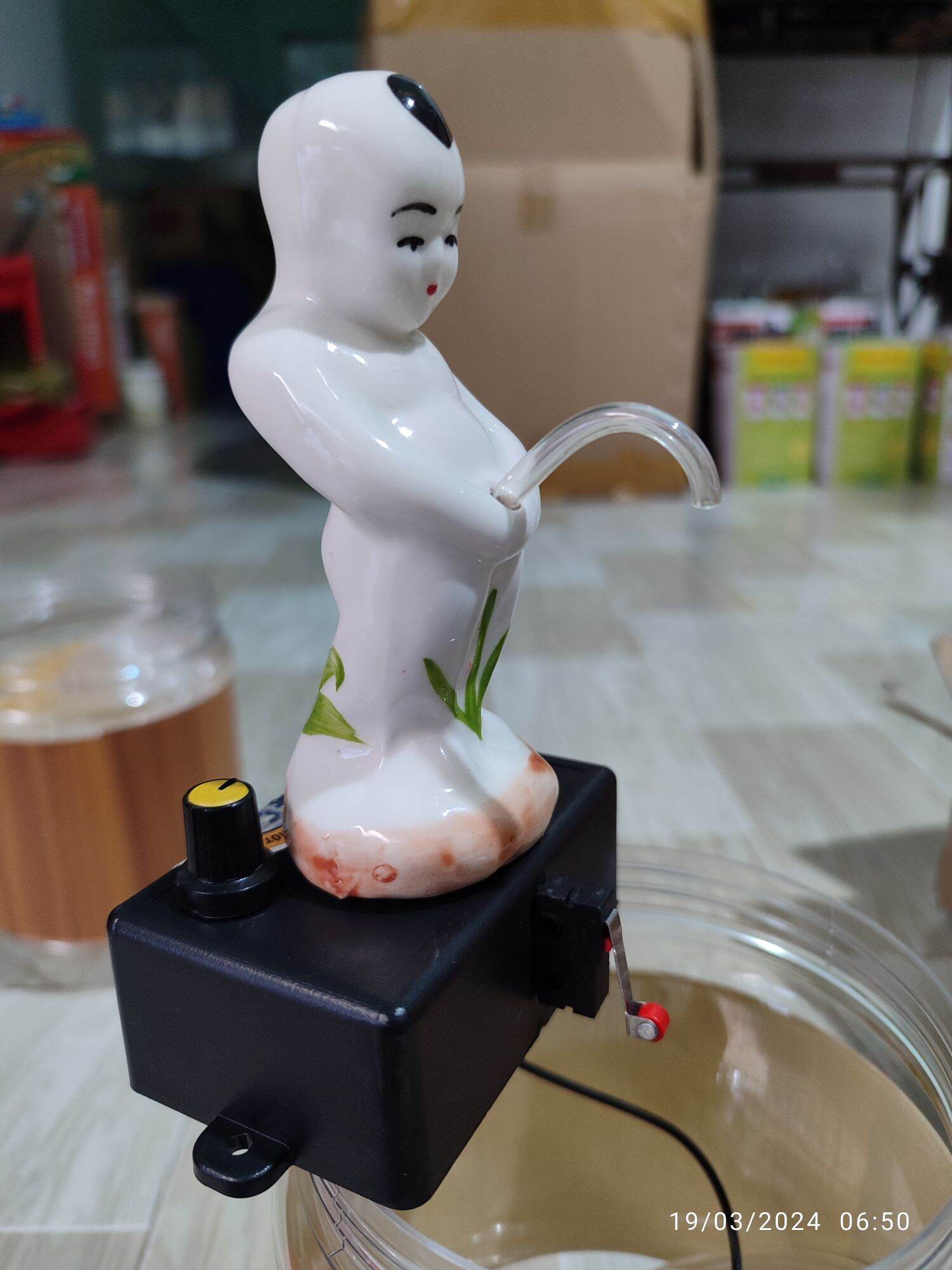 máy rót r,ượu chú tiểu tự động