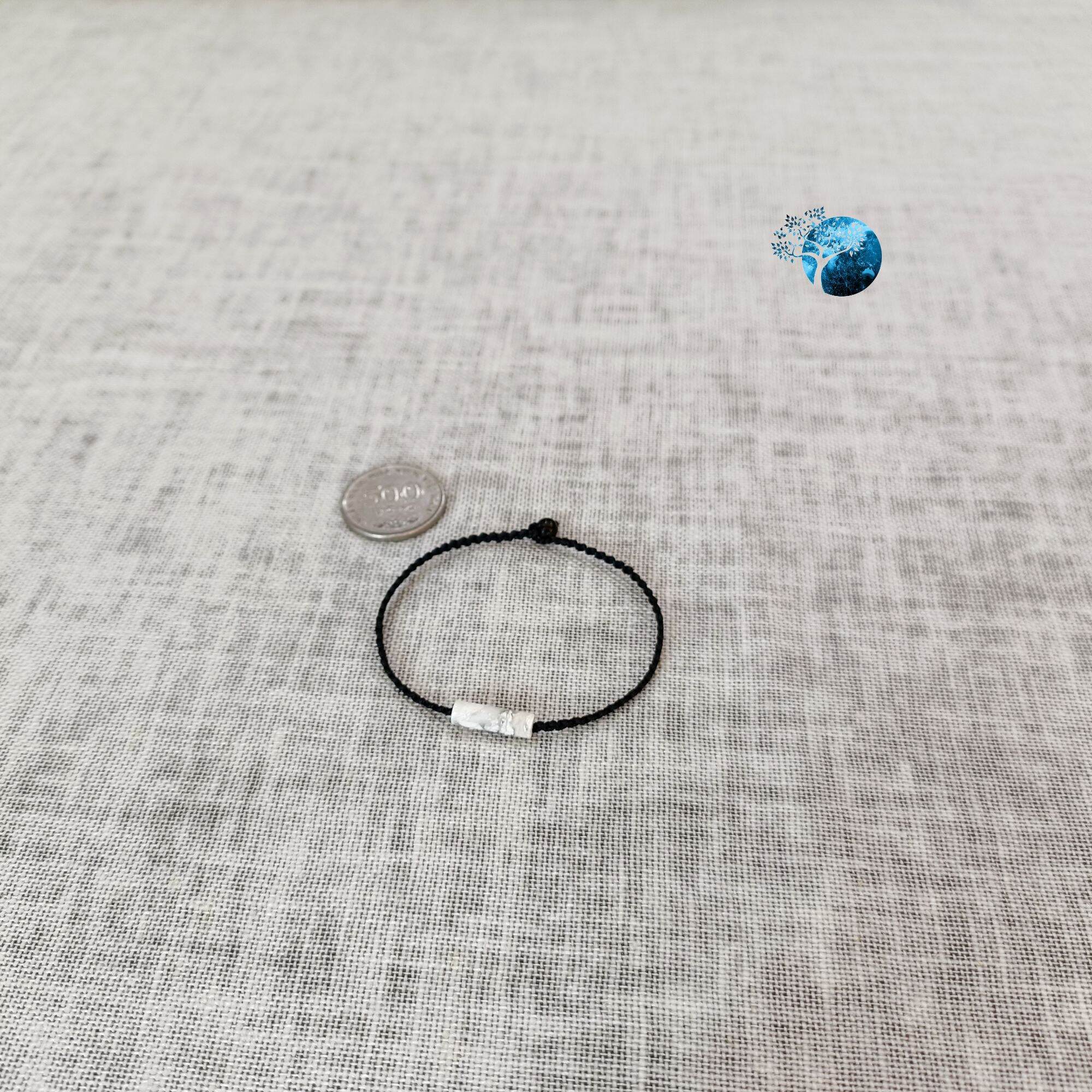 Vòng tay tết dây lu thống đá howlite (đá bạch tùng)