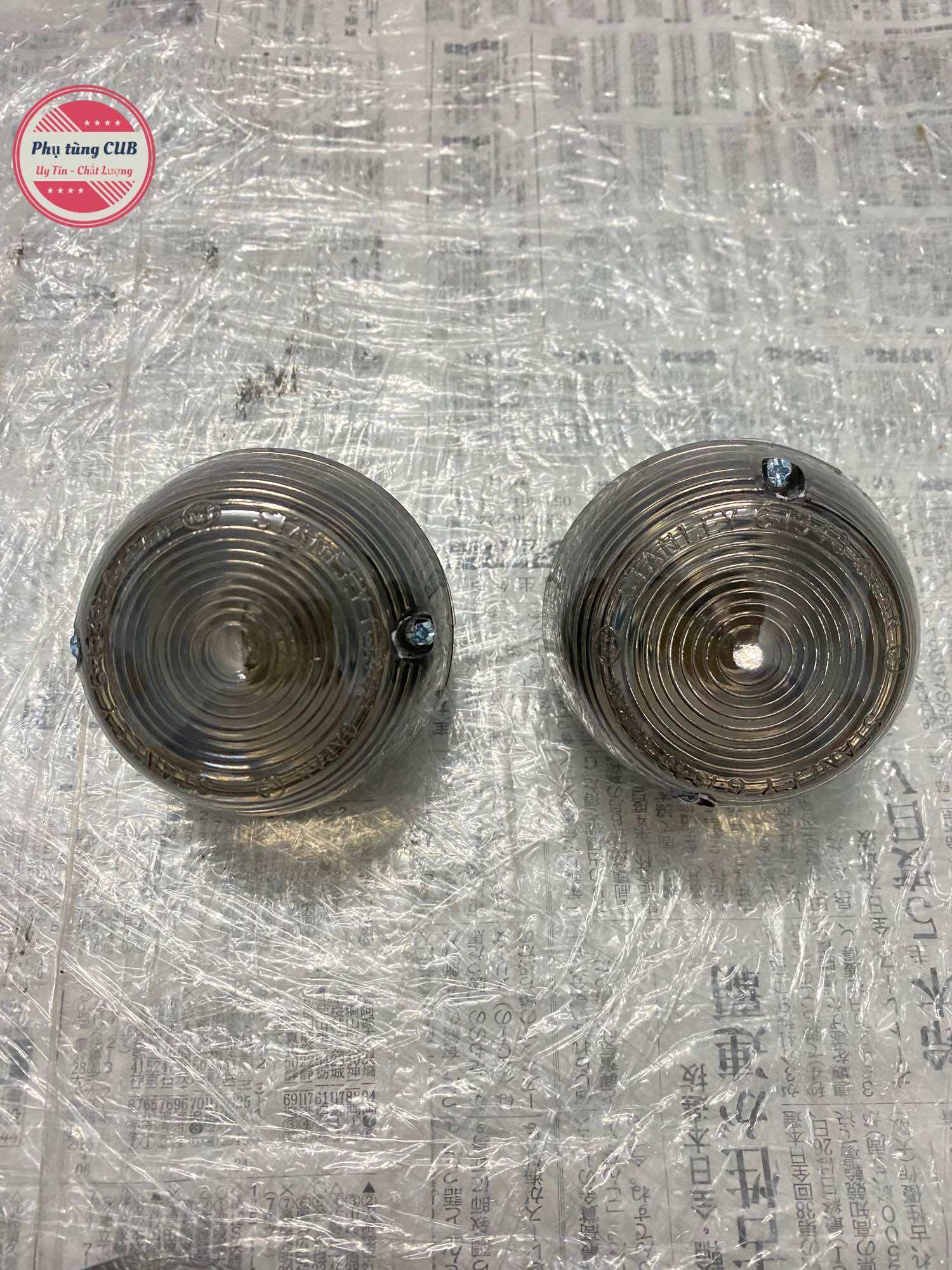 Bộ xi nhan xe cub 78 chụp màu khói ( đế trước inox, sau aitimon)