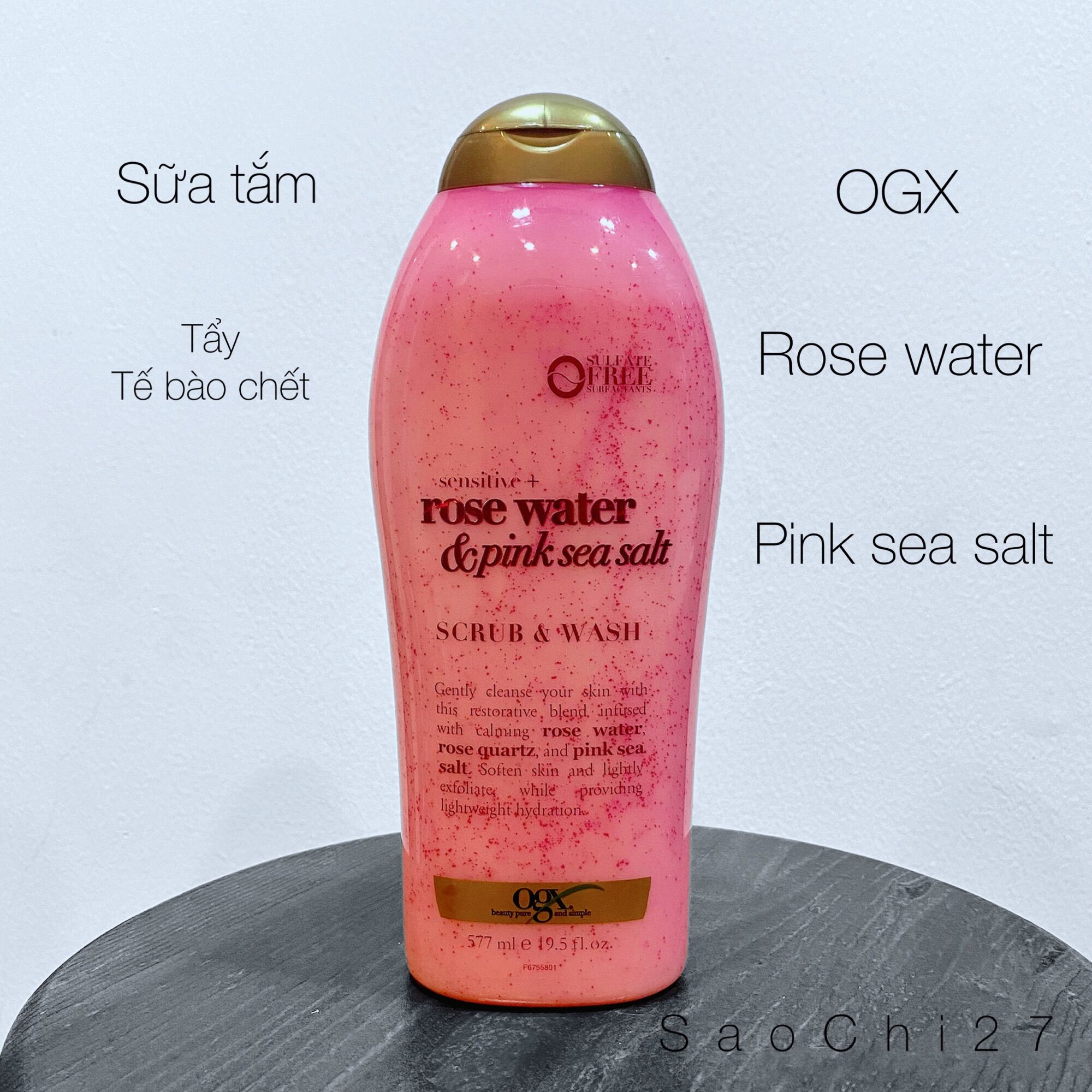 Sữa tắm tẩy tế bào chết cho da nhạy cảm OGX Rose water and Pink sea salt 577ml