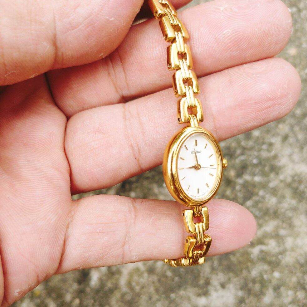 Đồng hồ nữ seiko, bọc vàng, mặt bầu dục, size 18mm, dây khóa zin bọc vàng thumbnail