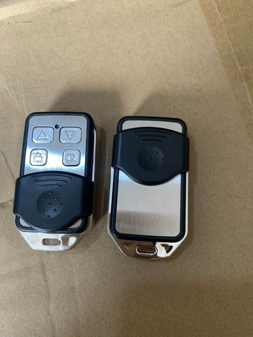 # Tay điều khiển cửa cuốn- Remote cửa cuốn mã gạt 433 mhz inox