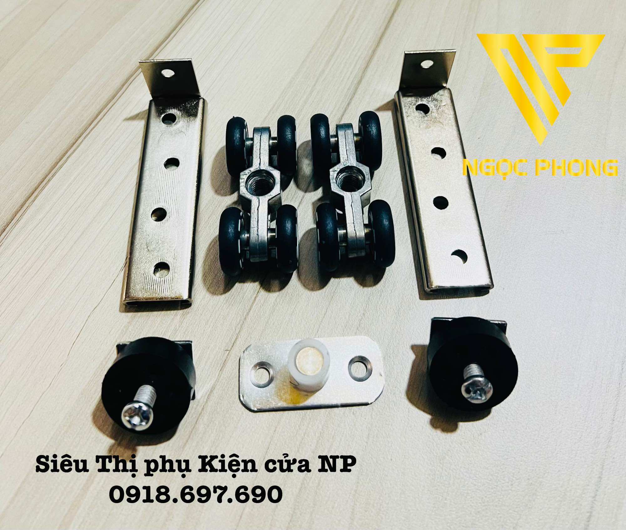 Bộ bánh xe treo cửa lùa nhôm - sắt -gỗ hộp tím