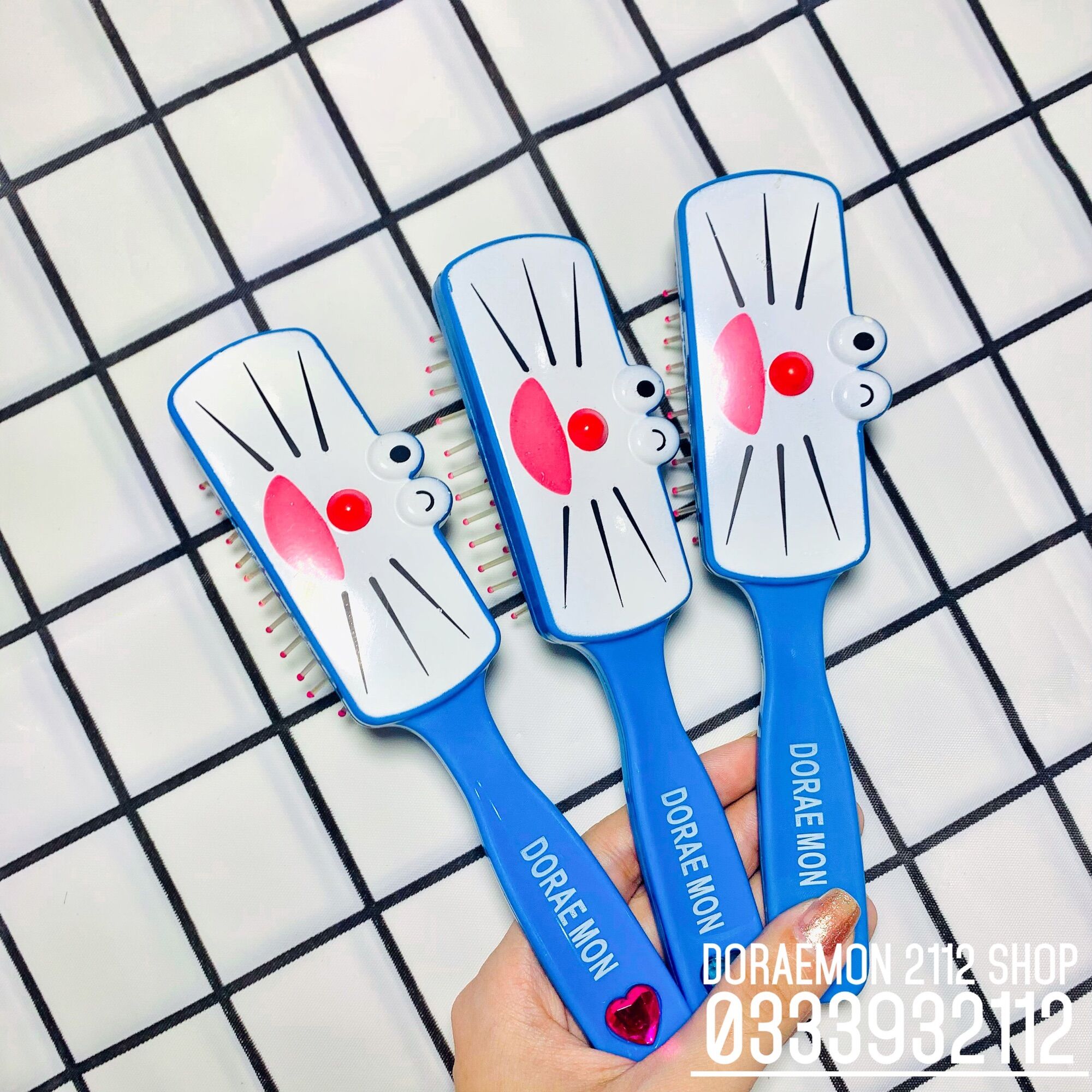 Lược chải tóc Doraemon dễ thương giúp gỡ rối và làm tóc óng mượt