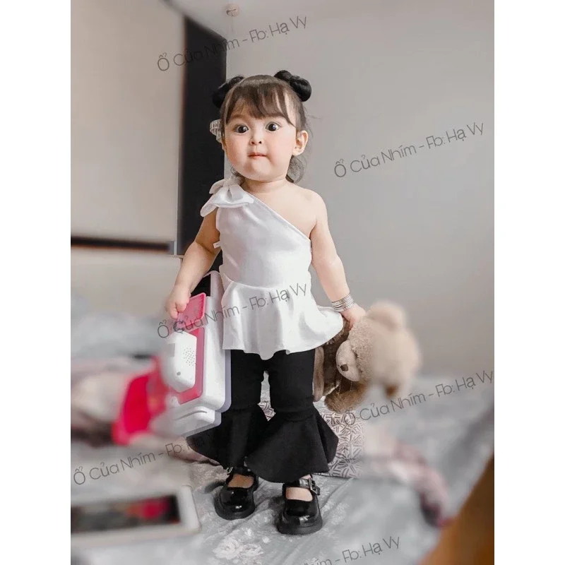 Sét áo nơ lệch vai quần loe cho bé