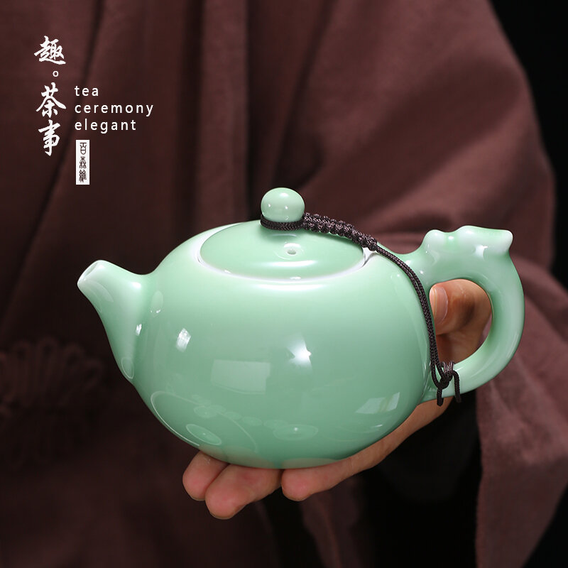 Ấm trà sứ xanh ấm đơn pha trà ấm trà tay cầm bên bộ cốc dụng cụ trà gốm sứ ấm pha trà tay cầm gia dụng lưới lọc tích hợp sẵn