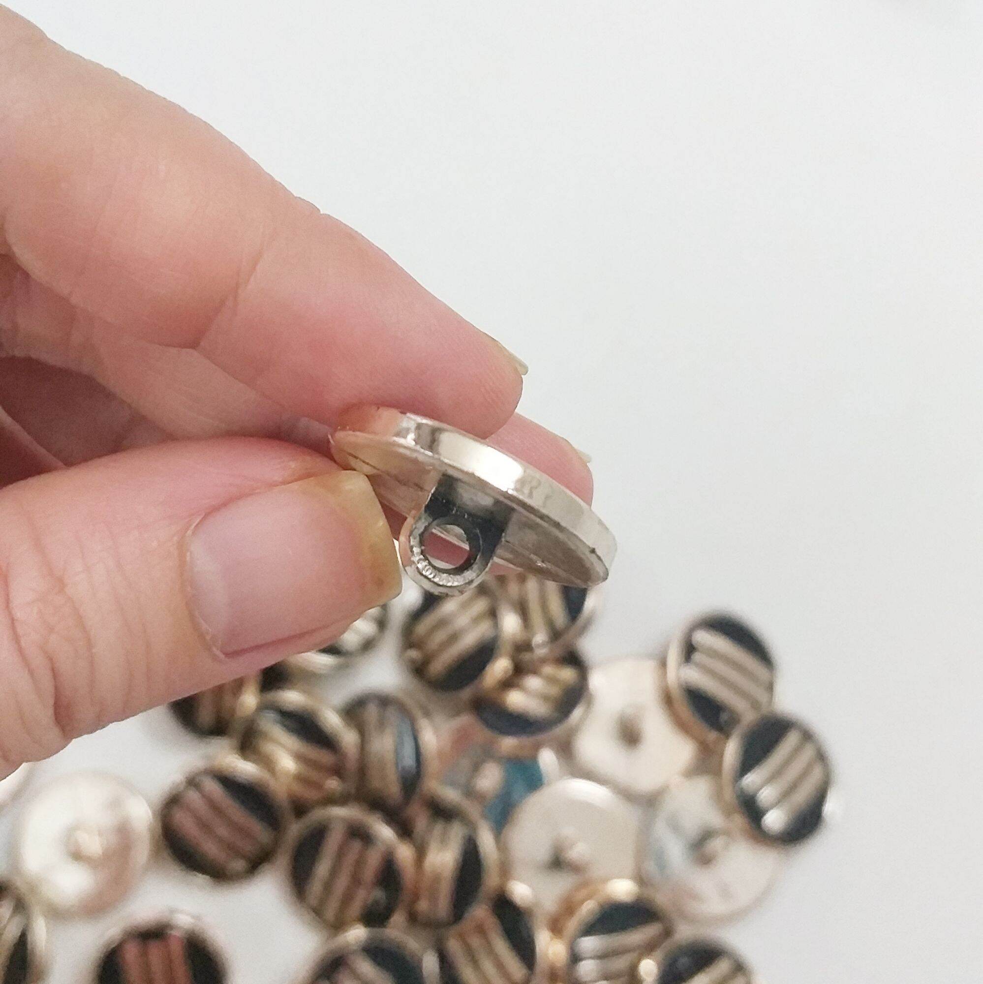 Nút vest nhựa  2 phân. bộ 5 nút