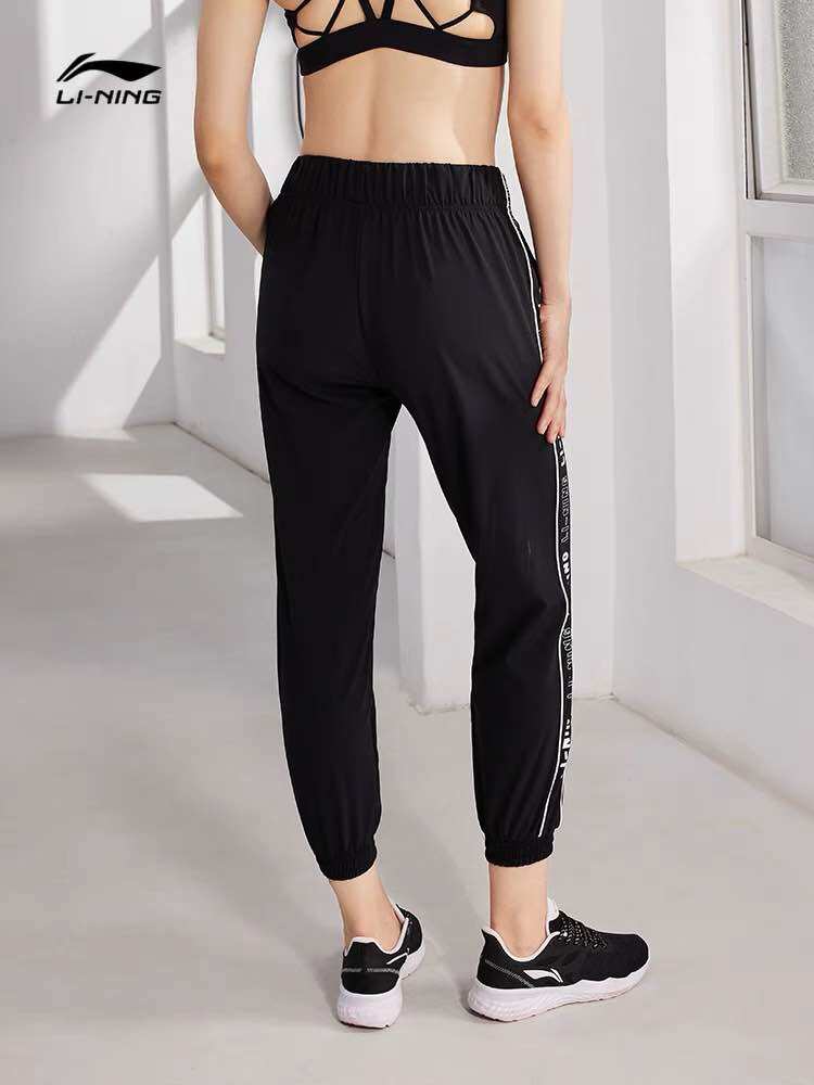 Quần gió nữ Lining AYKR136