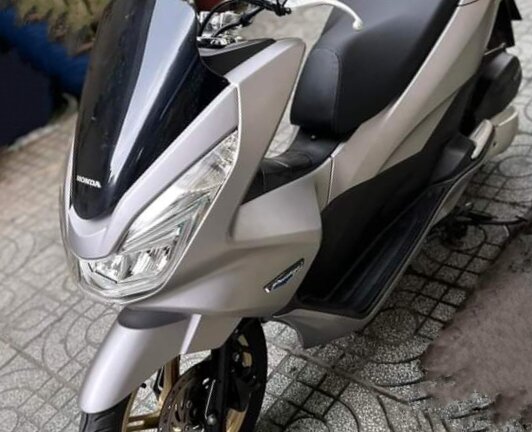 A Má bửng ốp chóa đèn pha trước PCX 125 2015 2016 ( Có bán lẻ từng bên )