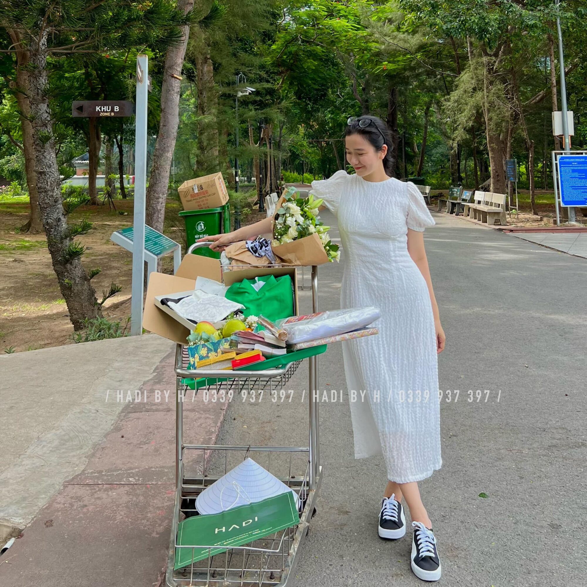 Đầm trắng vải nhún xốp dáng middi - Bạch
