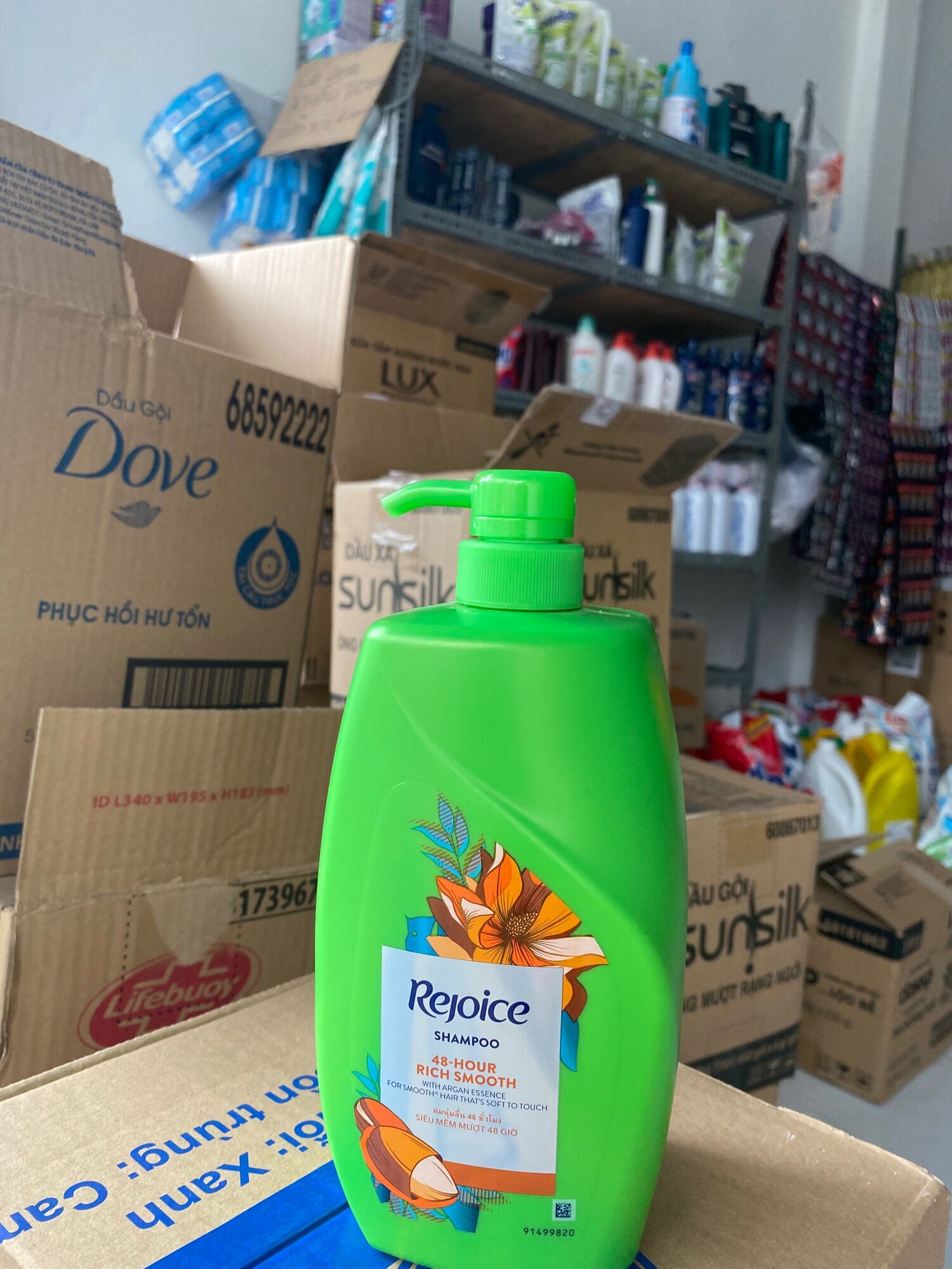 Dầu gội Rejoice mềm mượt chai 900ml