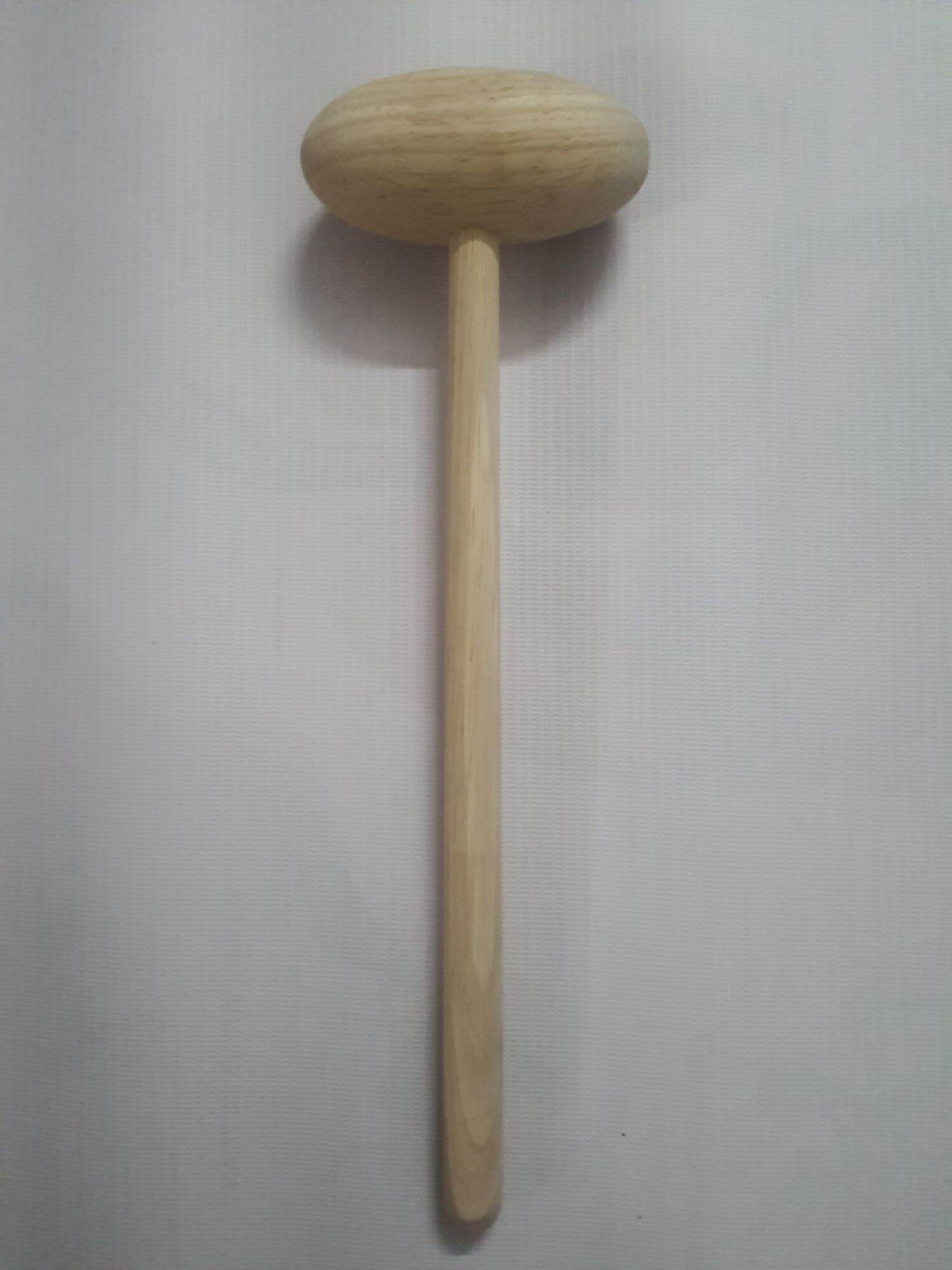 Búa gỗ gõ huyệt chân
