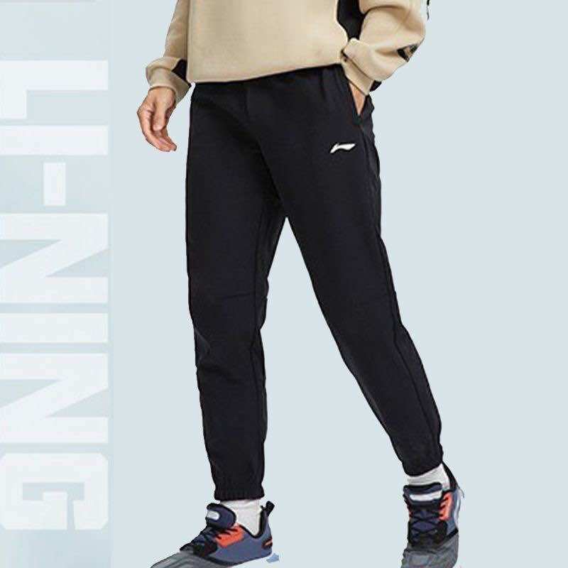 Quần gió nam lót lông lining aykr891
