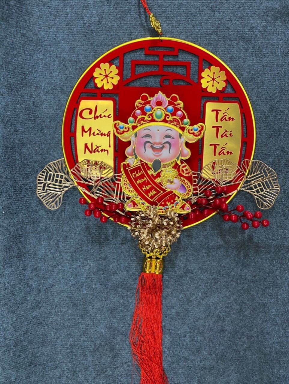 Thần tài lắc lư đầu gọi thần tài may mắn