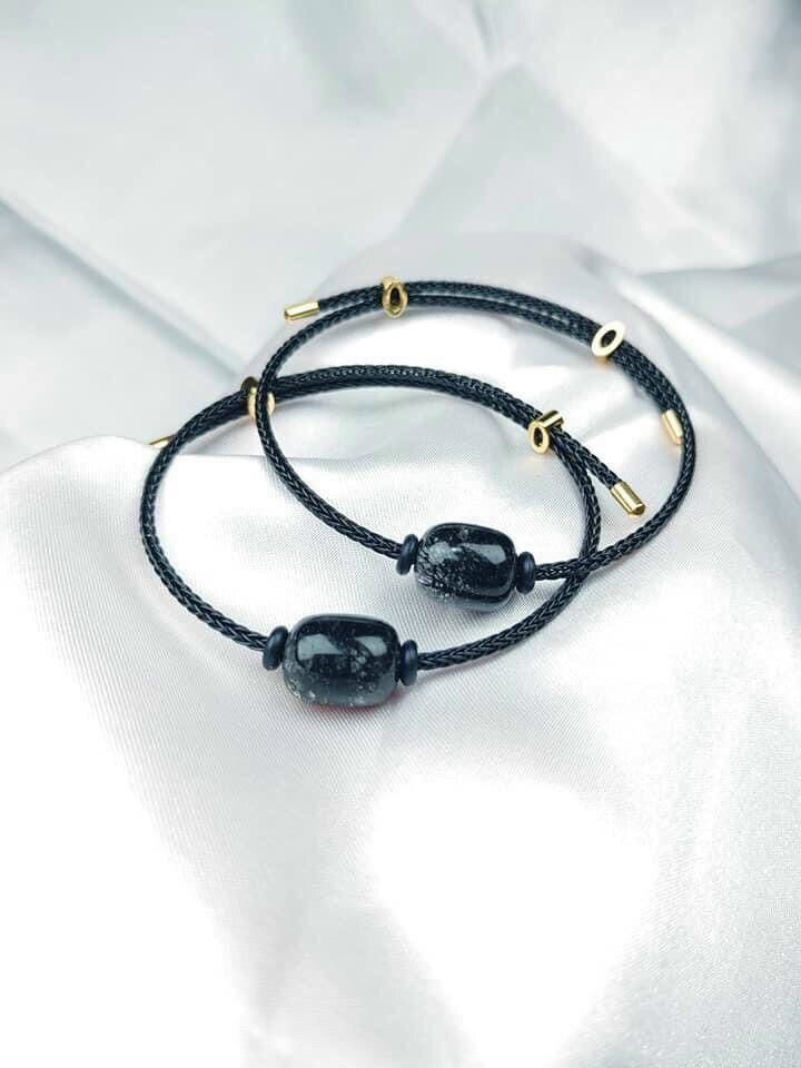 Vòng tay lu thống tóc đen