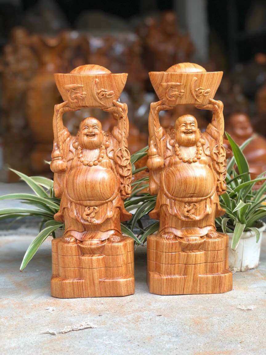 Di Lặc Dâng Thỏi Vàng