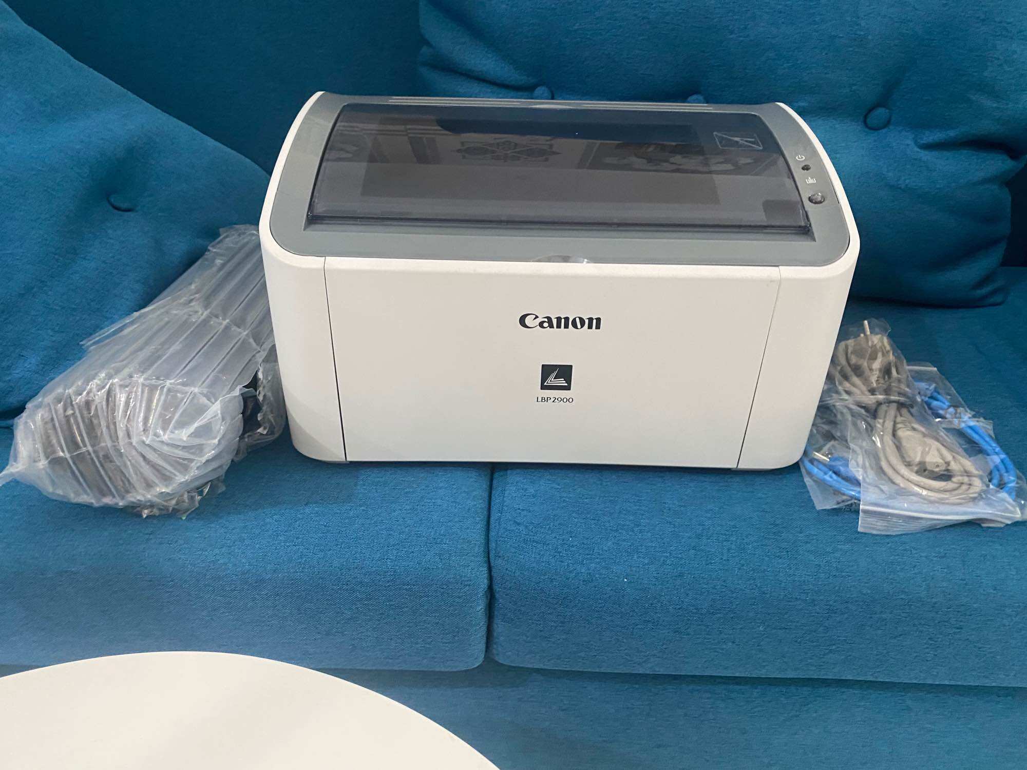 miếng đỡ giấy Canon 2900 zin mới 100%