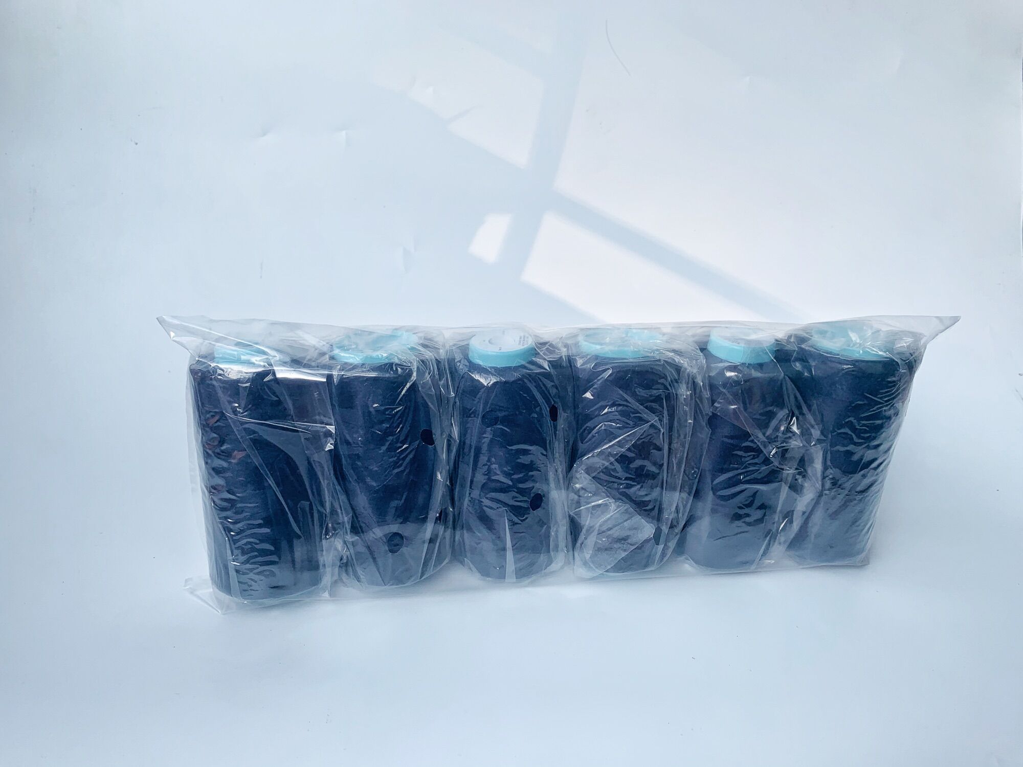 Vỉ 6 cuộn chỉ tơ vắt sổ màu xanh than