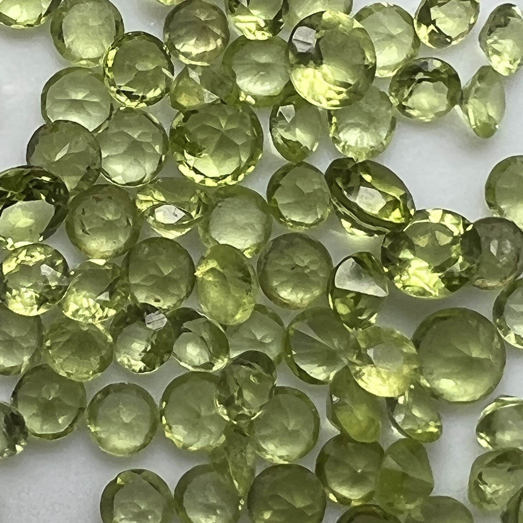 315-GIÁ 1 VIÊN ĐÁ PERIDOT TẤM ( THIÊN NHIÊN) 3 ly