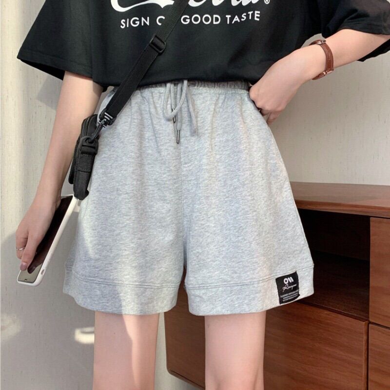 Quần đùi lô gô gấu