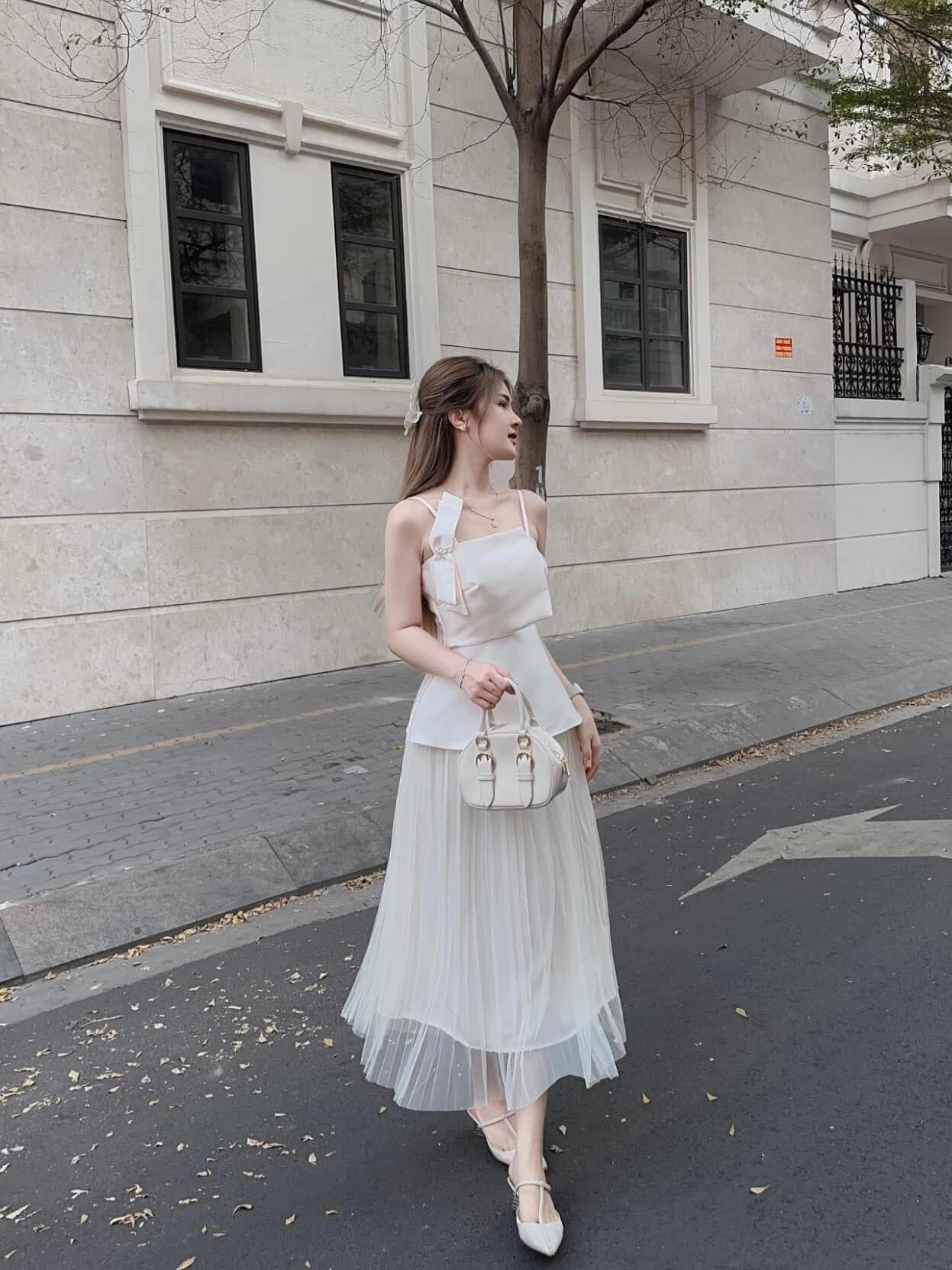 Set áo 2 dây nơ peplum phối chân váy lưới