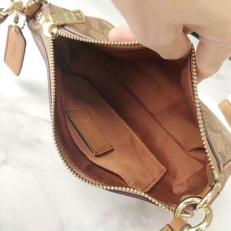 Túi Coach thuyền xuất dư xịn