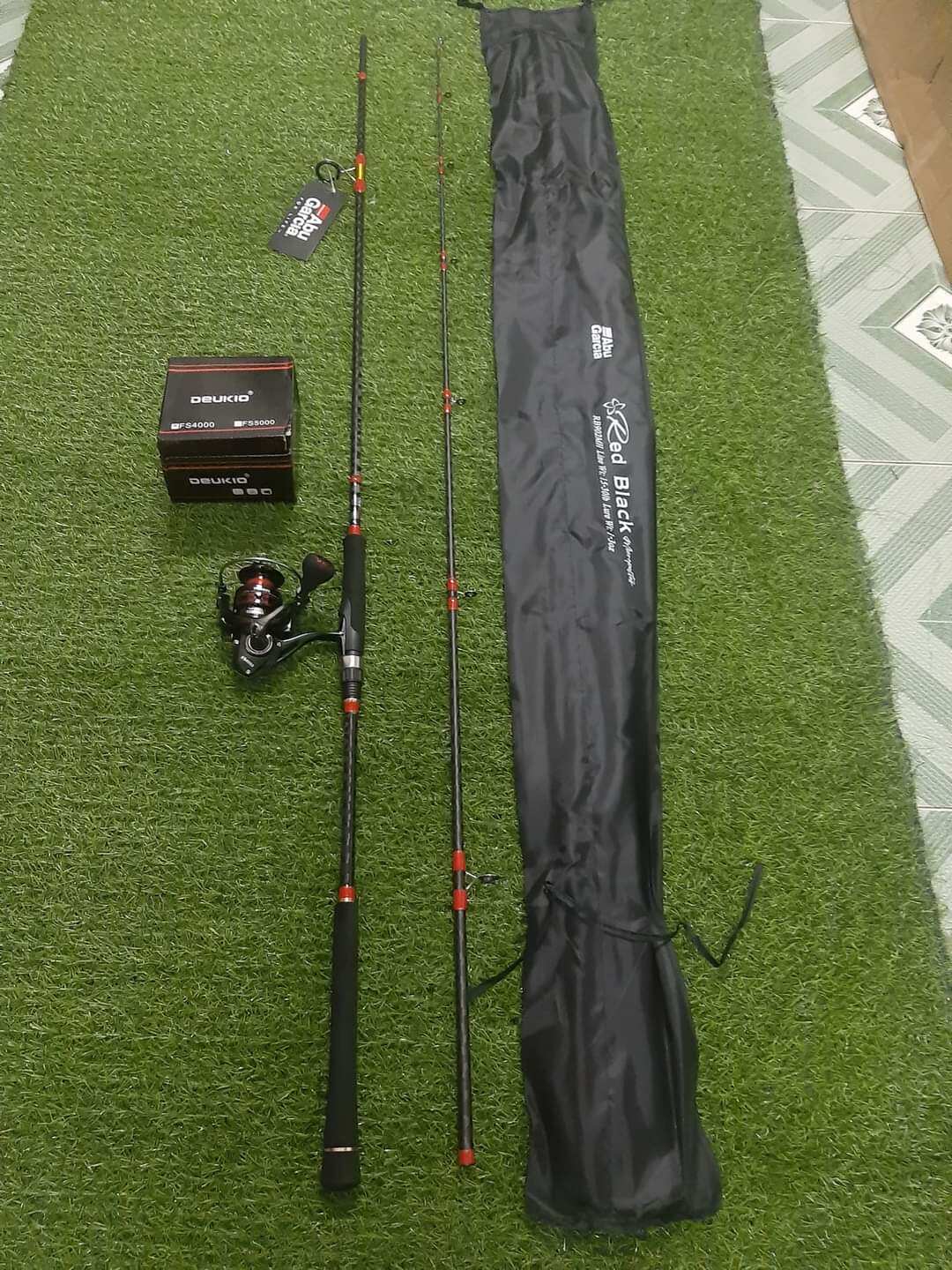 Combo cần câu lure bạo lực abu red black + máy kim loại deukio fs siêu chất lượng