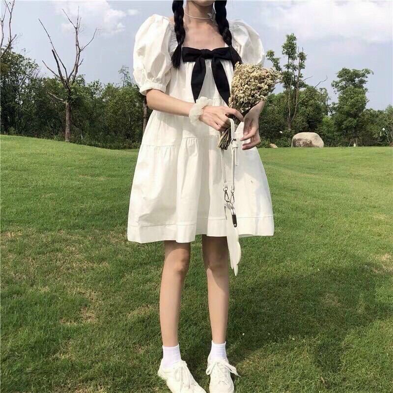 [HCM] Đầm babydoll trắng nơ đen siêu đáng yêu