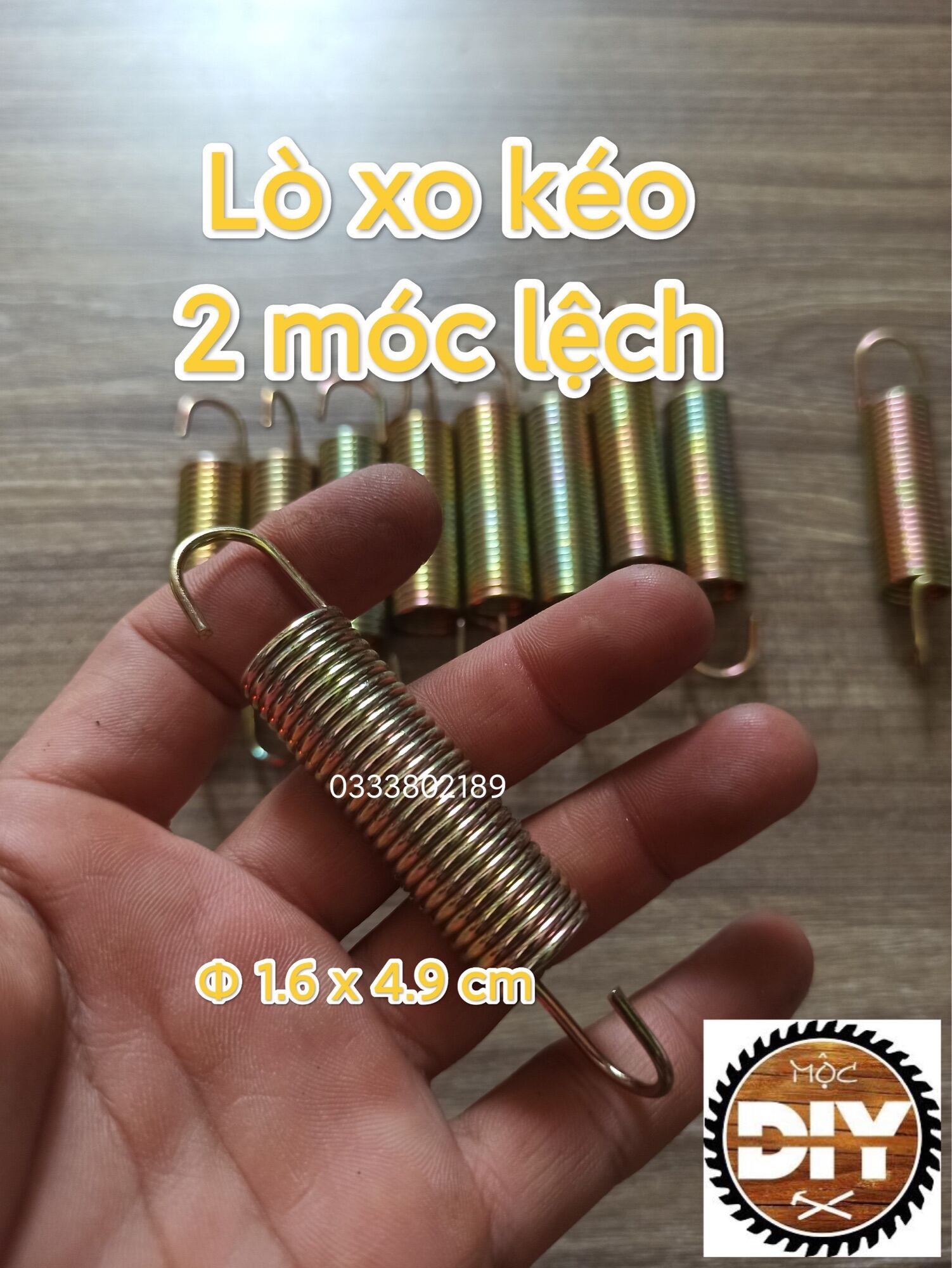 Lò xo kéo 2 móc lệch phi 16