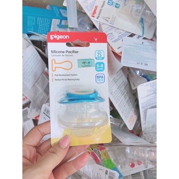 Núm ty ngậm giả Pigeon