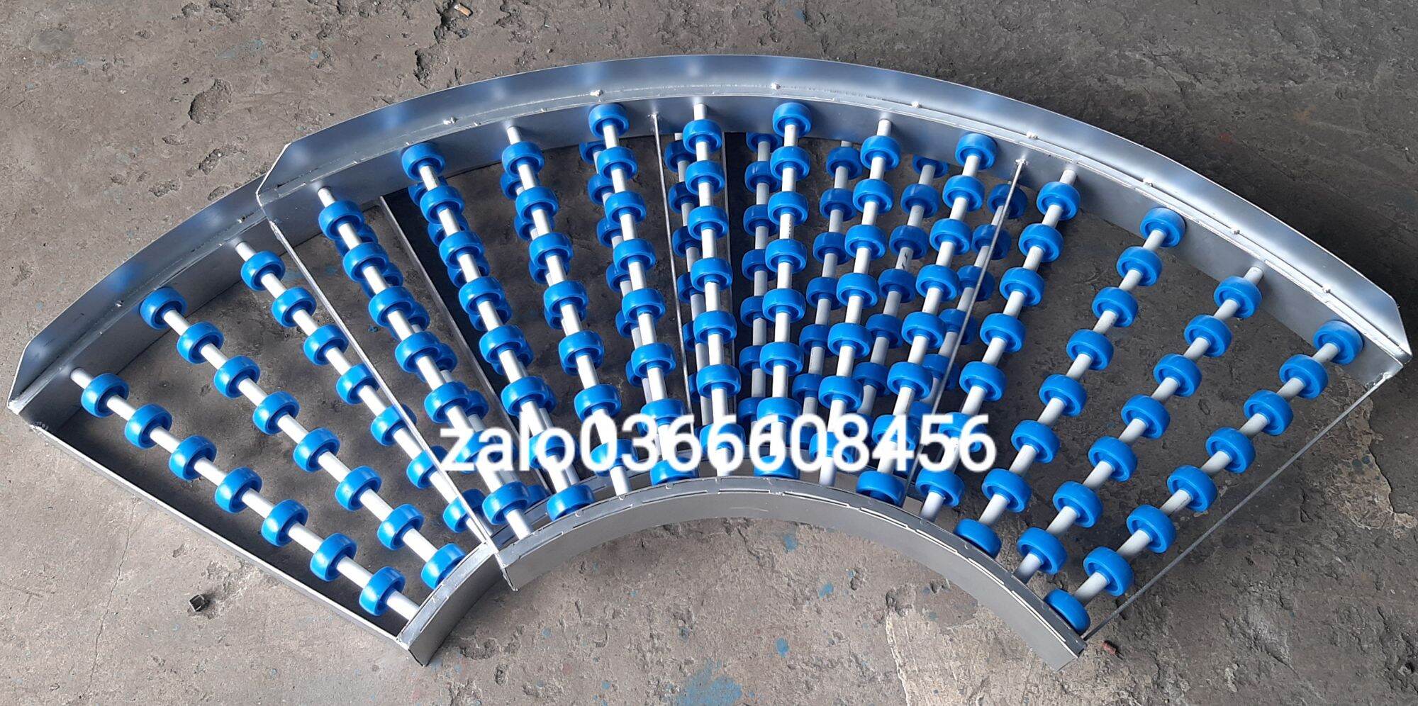 Băng tải con lăn cong 90 độ