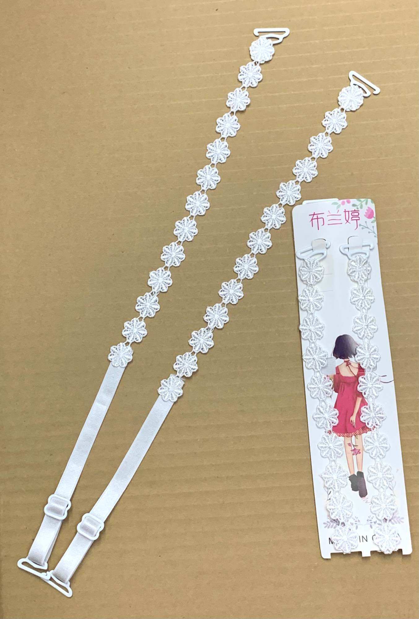 1 cặp dây áo ngực bằng ren chỉ.