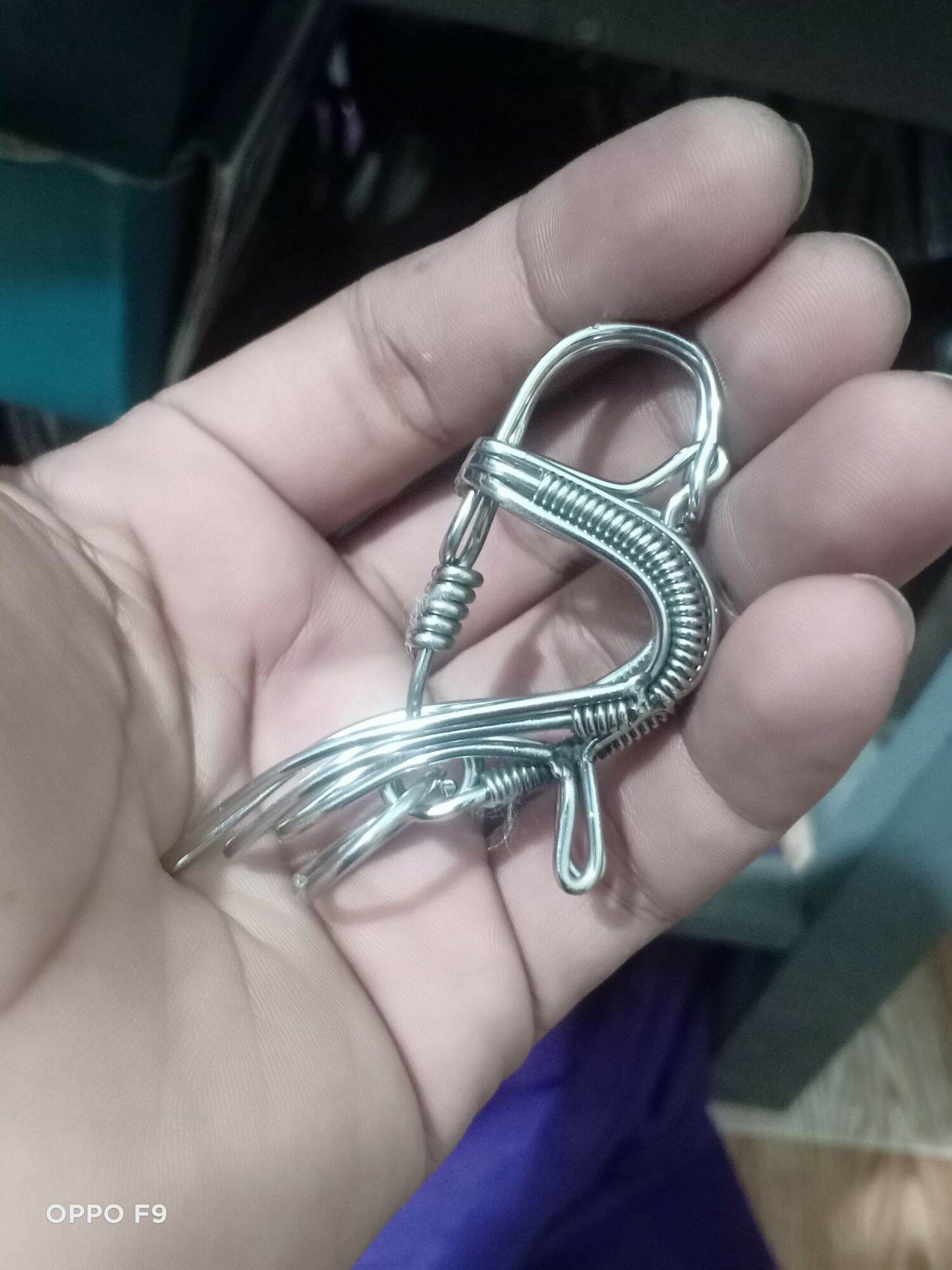 móc khoá inox uốn thủ công