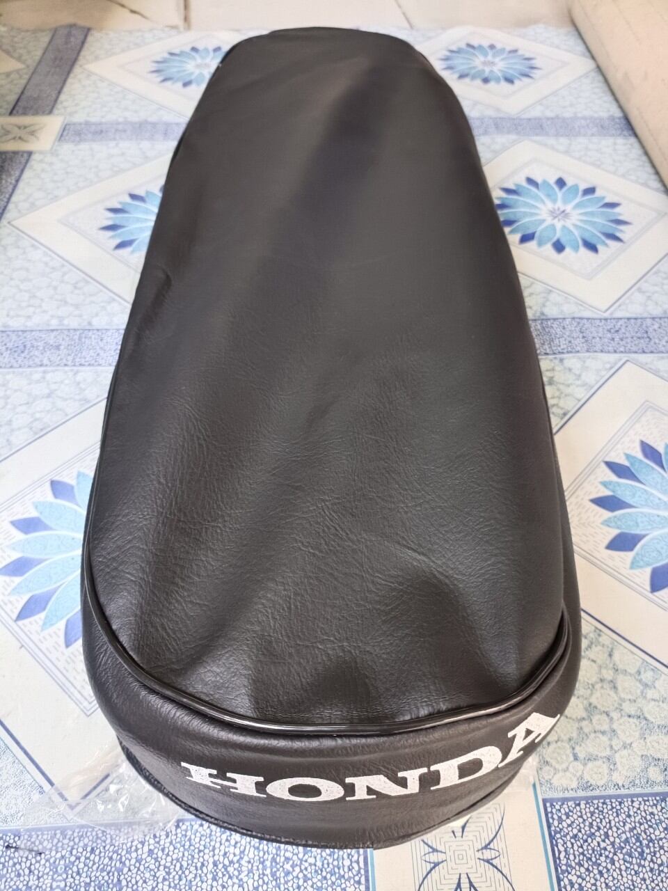 Áo yên xe 67 đời cũ