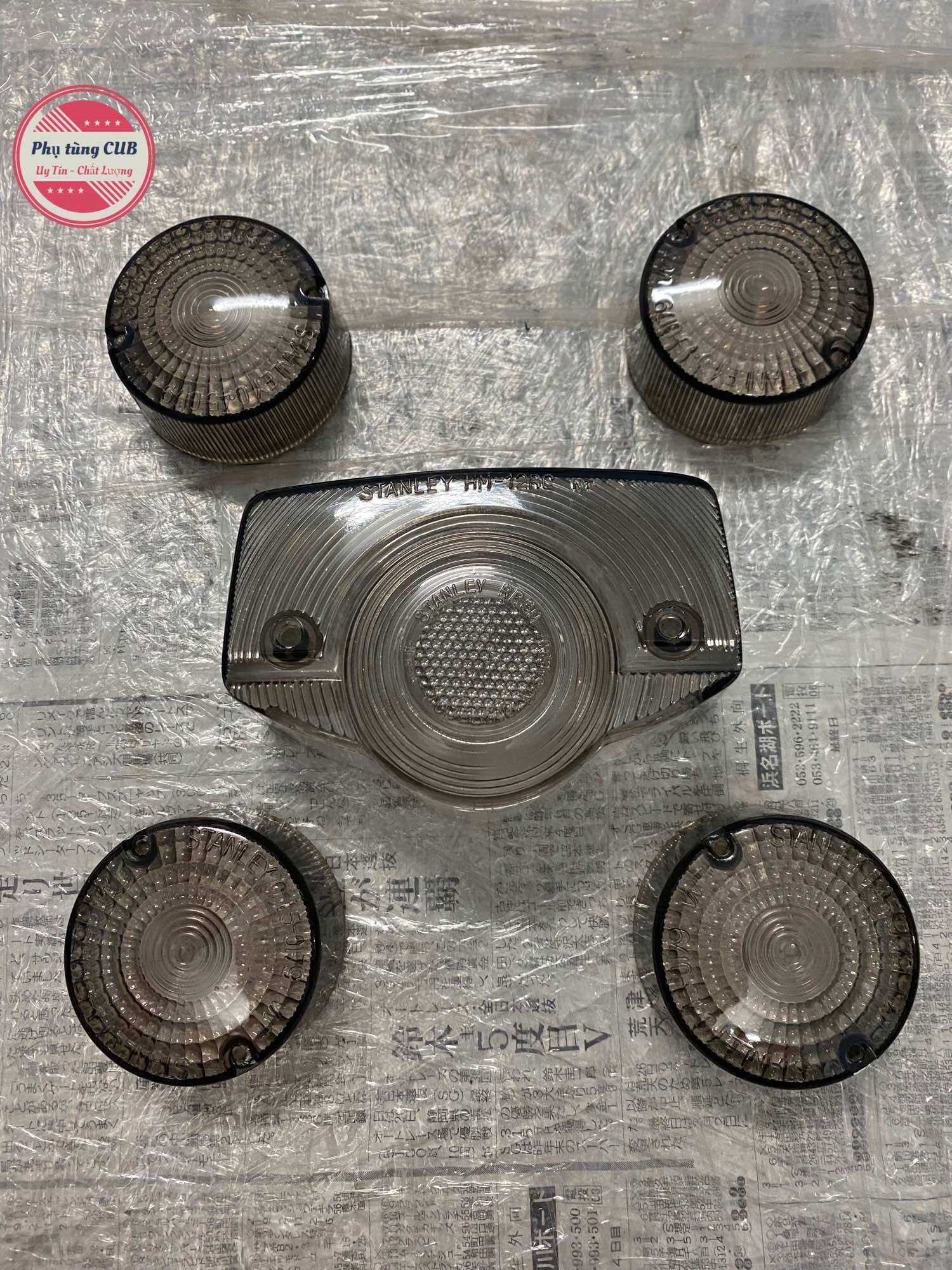 Bộ chụp xi nhan và đèn hậu cub 81/70 màu khói