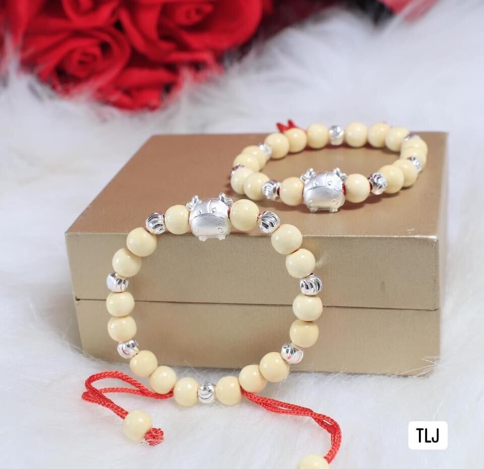 Vòng dâu tằm mix con giáp cho bé