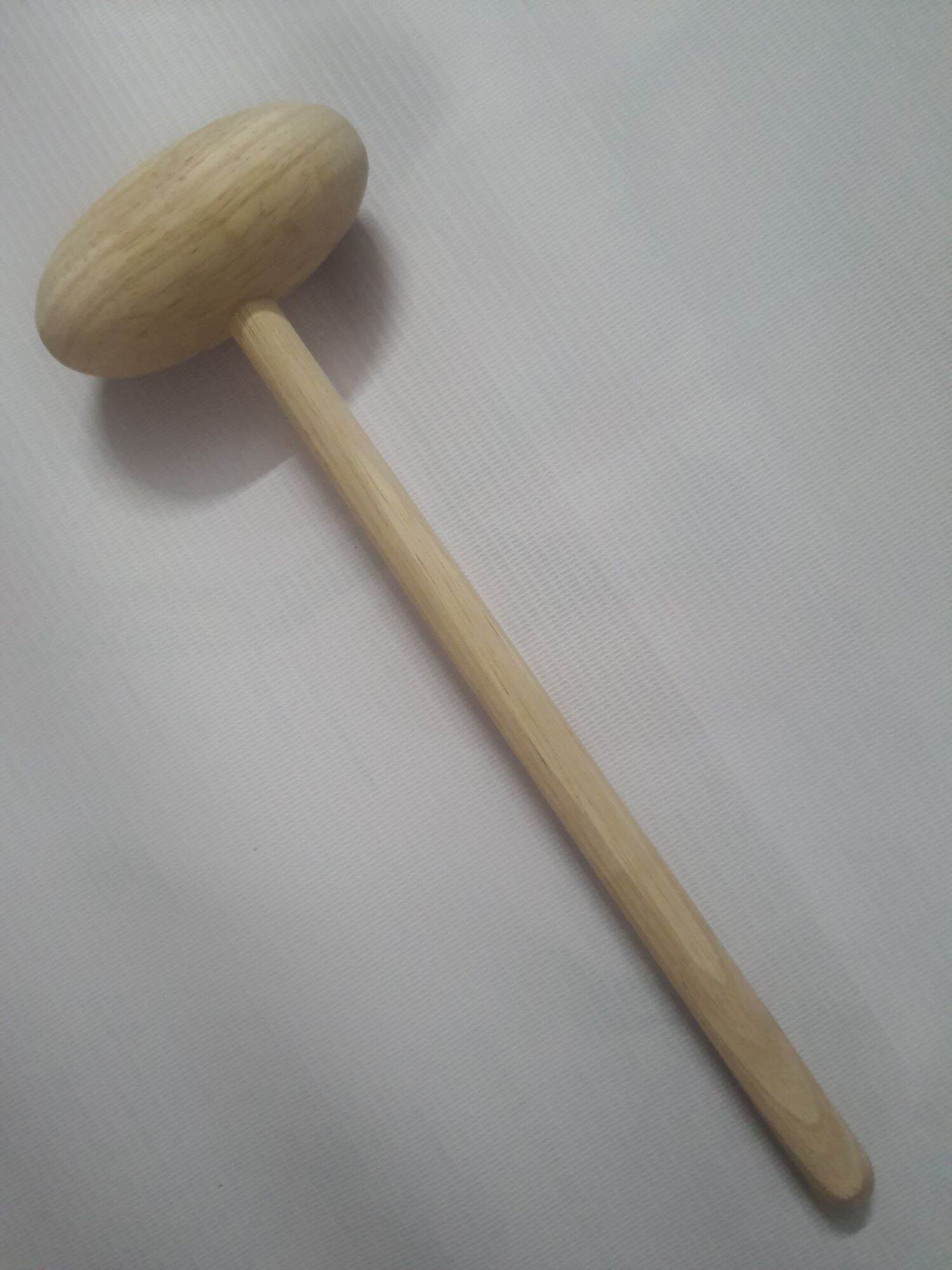 Búa gỗ gõ huyệt chân