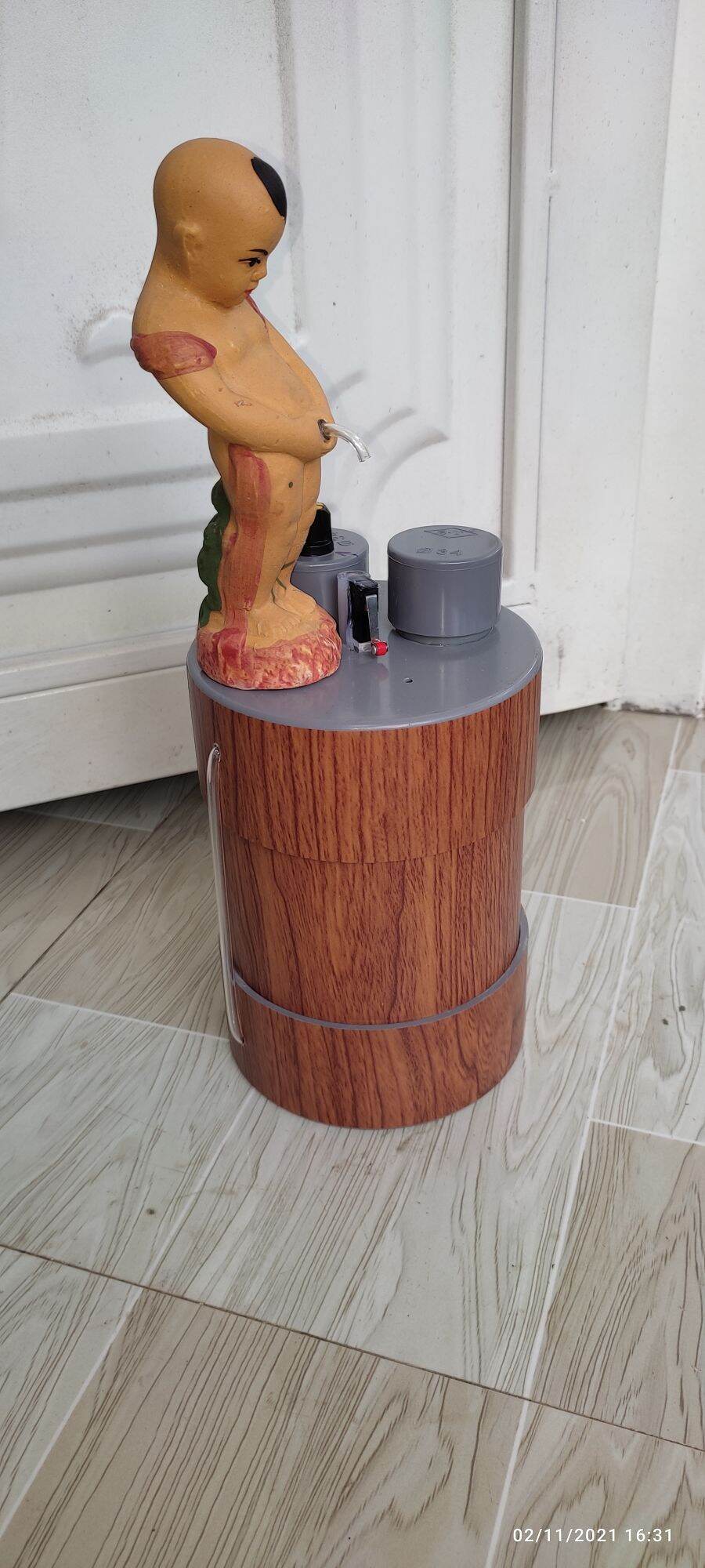 MIỄN PHÍ SÍP bình rót ruou chú tiểu tự động 1,5 lít