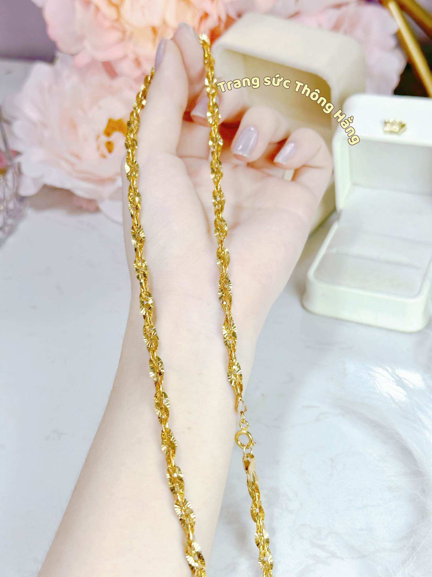 Dây chuyền đồng xoắn lá khoá tròn ký hiệu