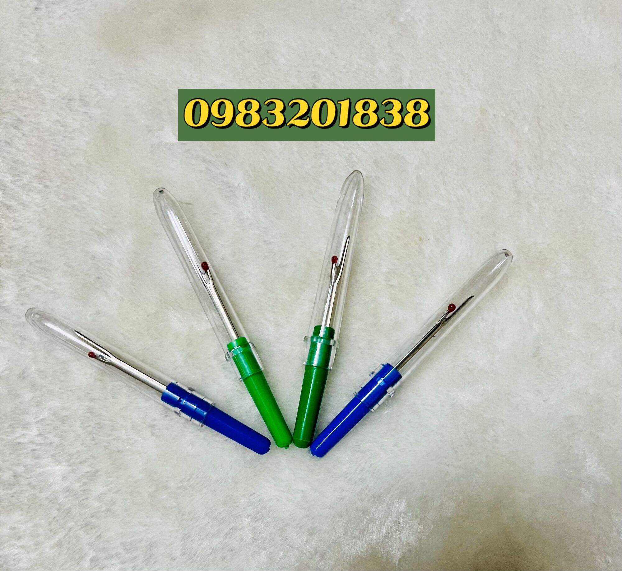 Nhẫn thêu và cây gỡ chỉ