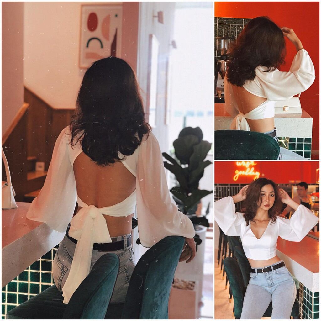 Áo croptop cổ V, tay dài thắt nơ sau lưng, có đính kèm mút ngực