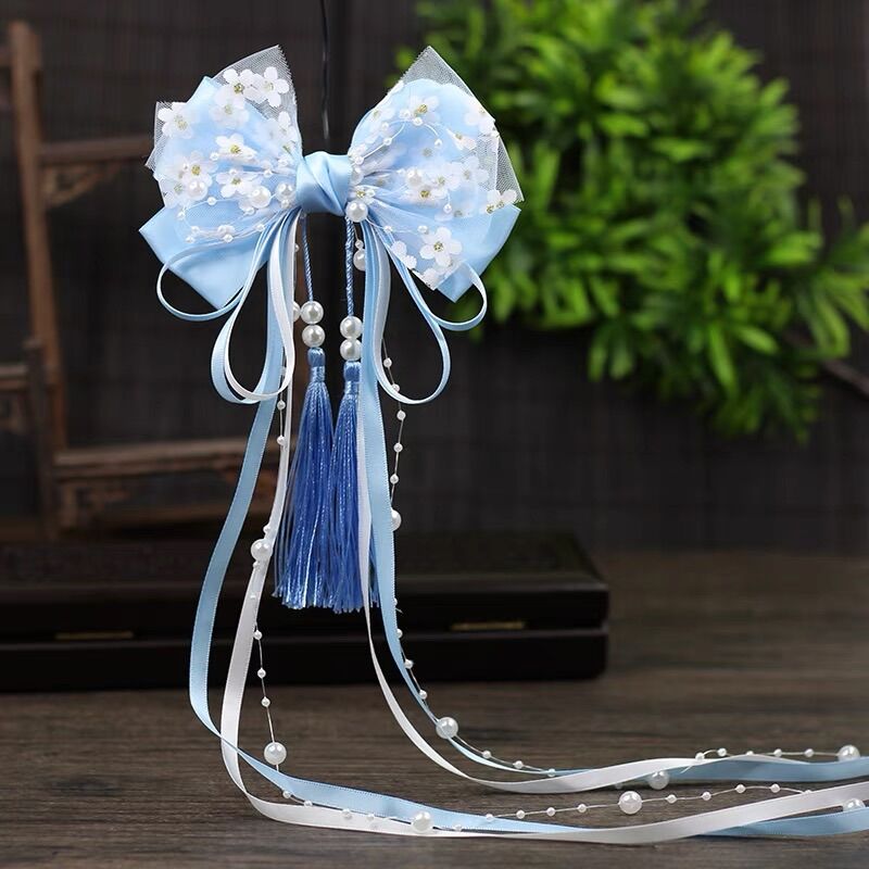 Kẹp nơ cổ trang cách điệu dây hạt trai