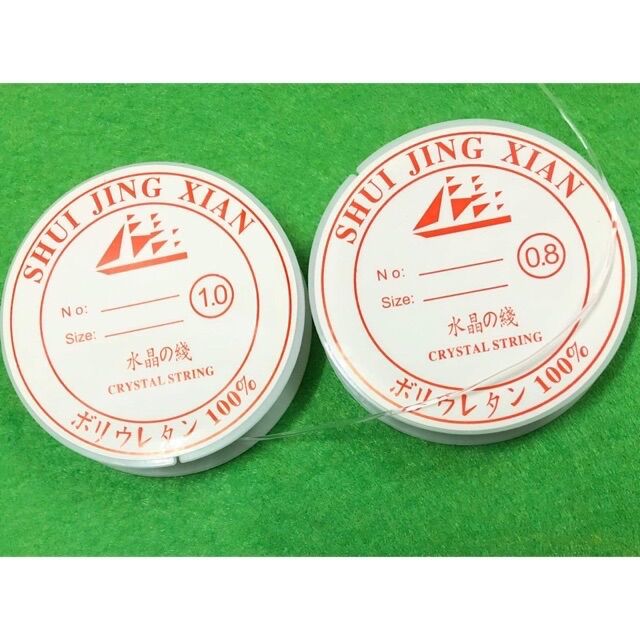 Cước thun tròn xỏ hạt cườm, hạt trai, chuỗi đeo tay. Giá bán 1 cuộn, có 2 cỡ để chọn lựa