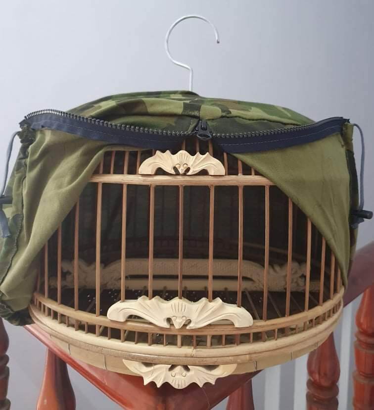 ÁO TRÙM LỒNG NUÔI CU GÁY