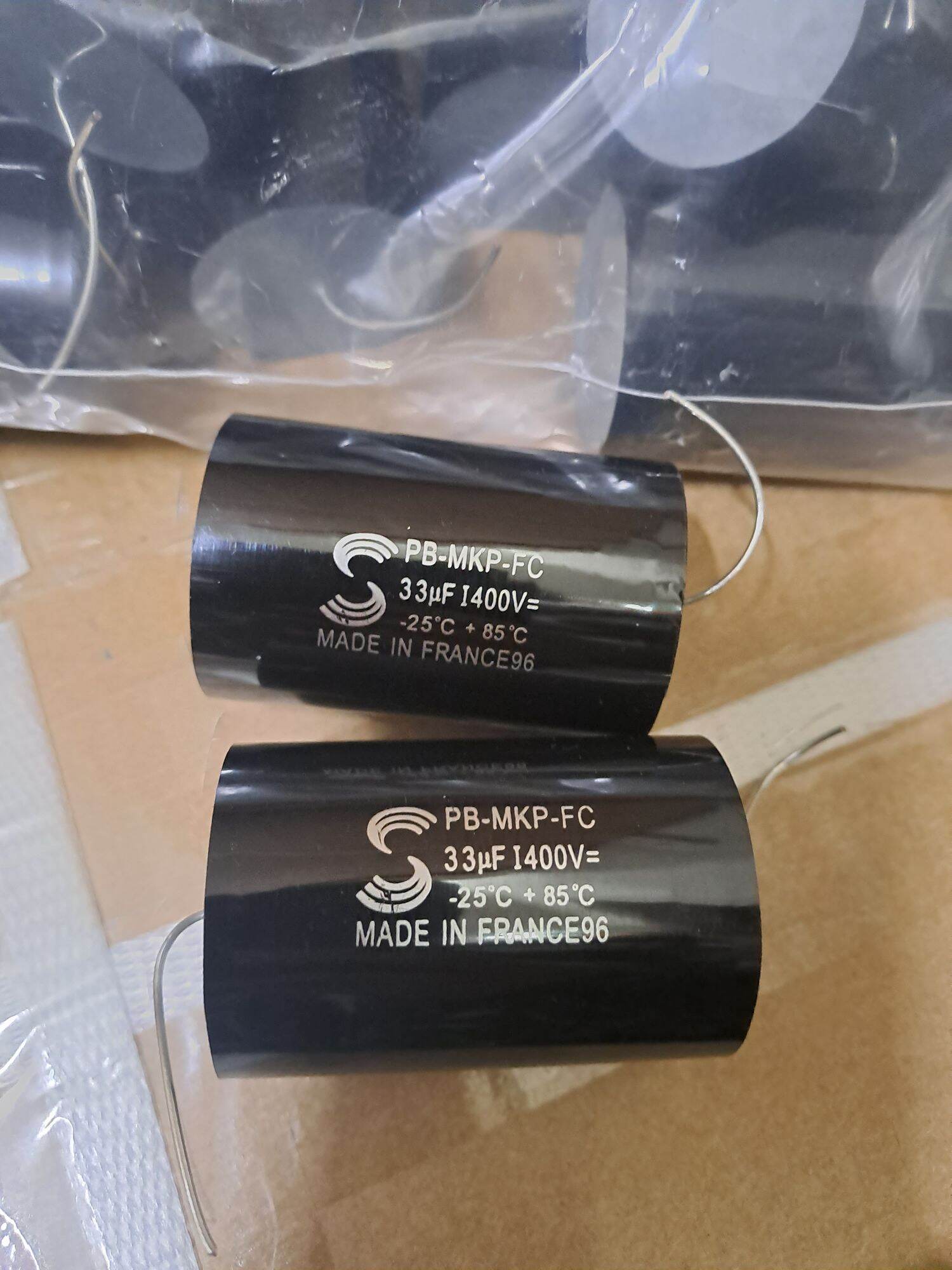 2 tụ phân tần loa 33uf 400v
