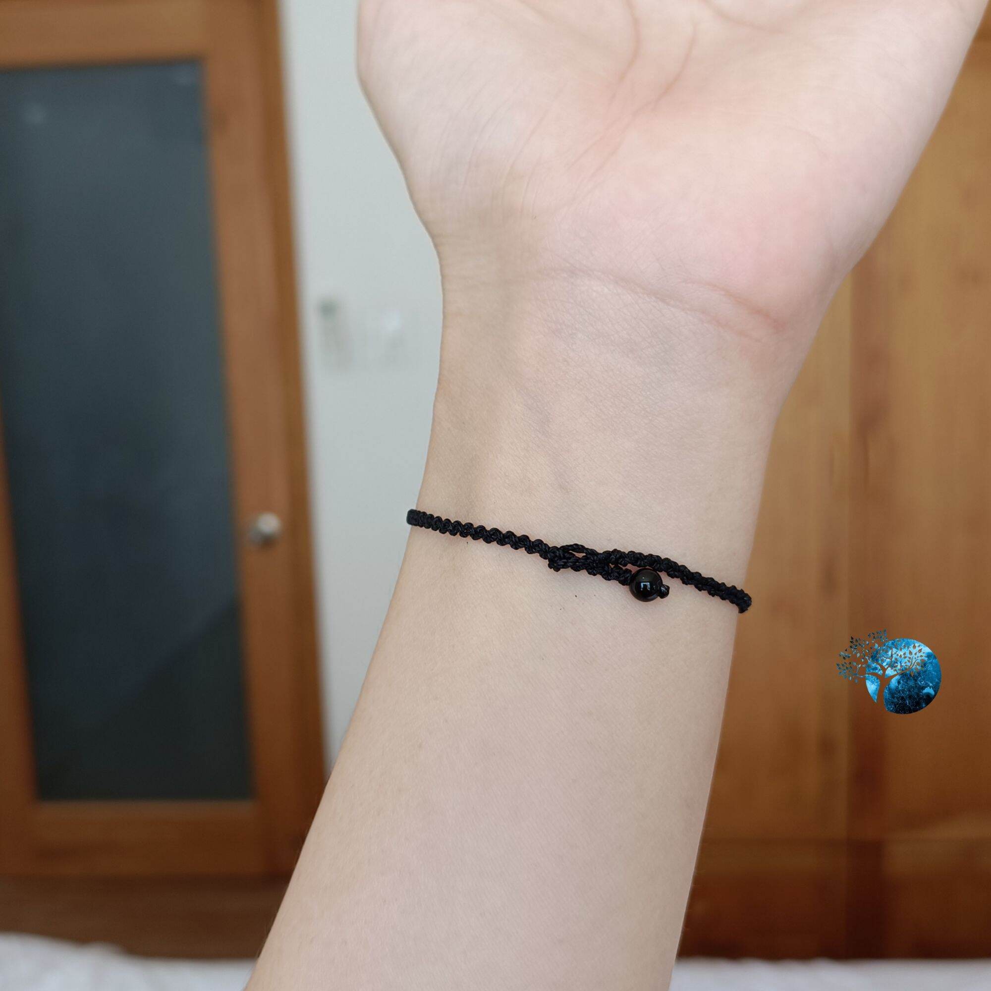 Vòng tay tết dây lu thống đá howlite (đá bạch tùng)