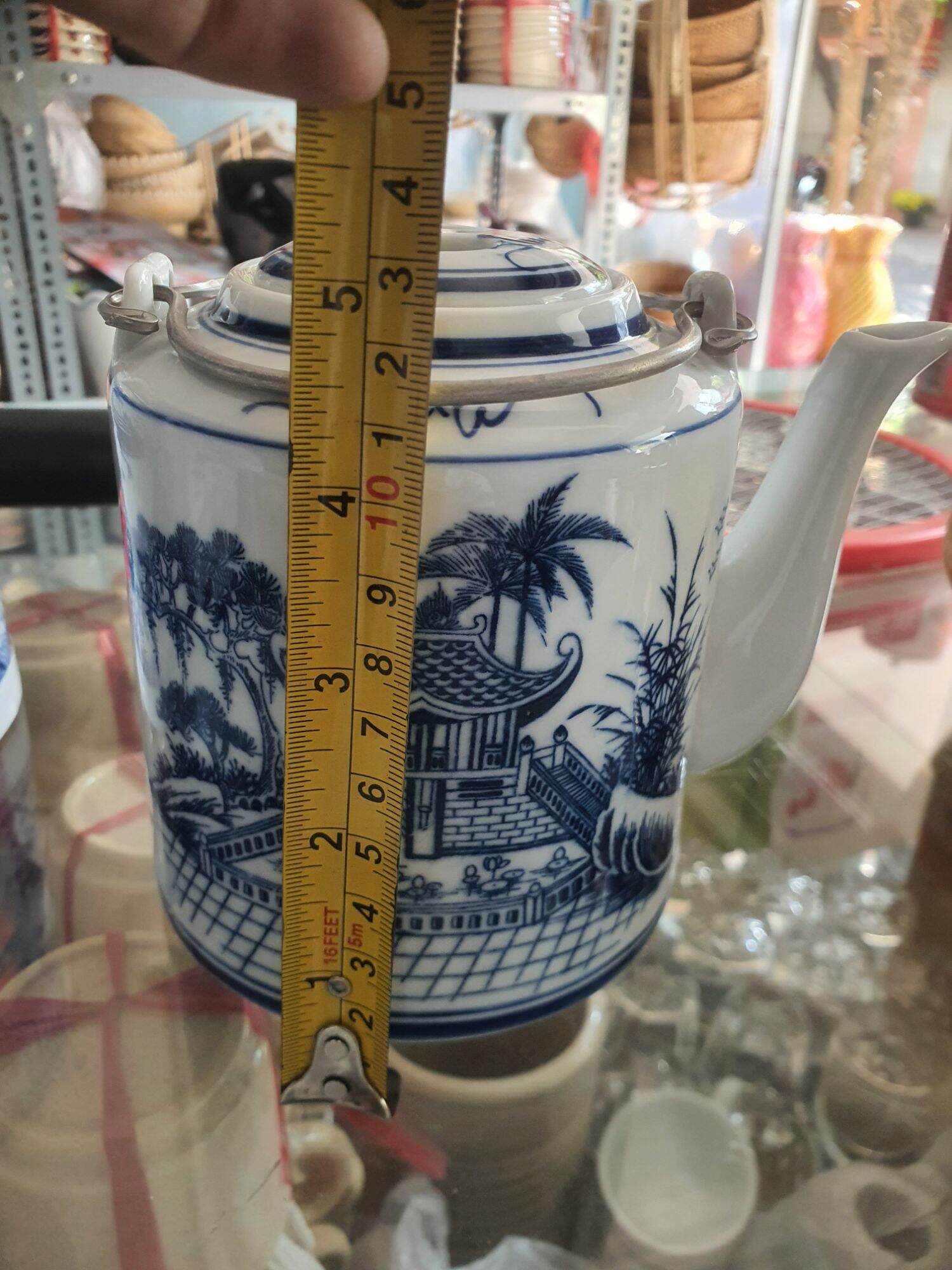 Bộ bình trà 800ml kèm 6 tách ( cao 12cm ) hoa văn ngẫu nhiên
