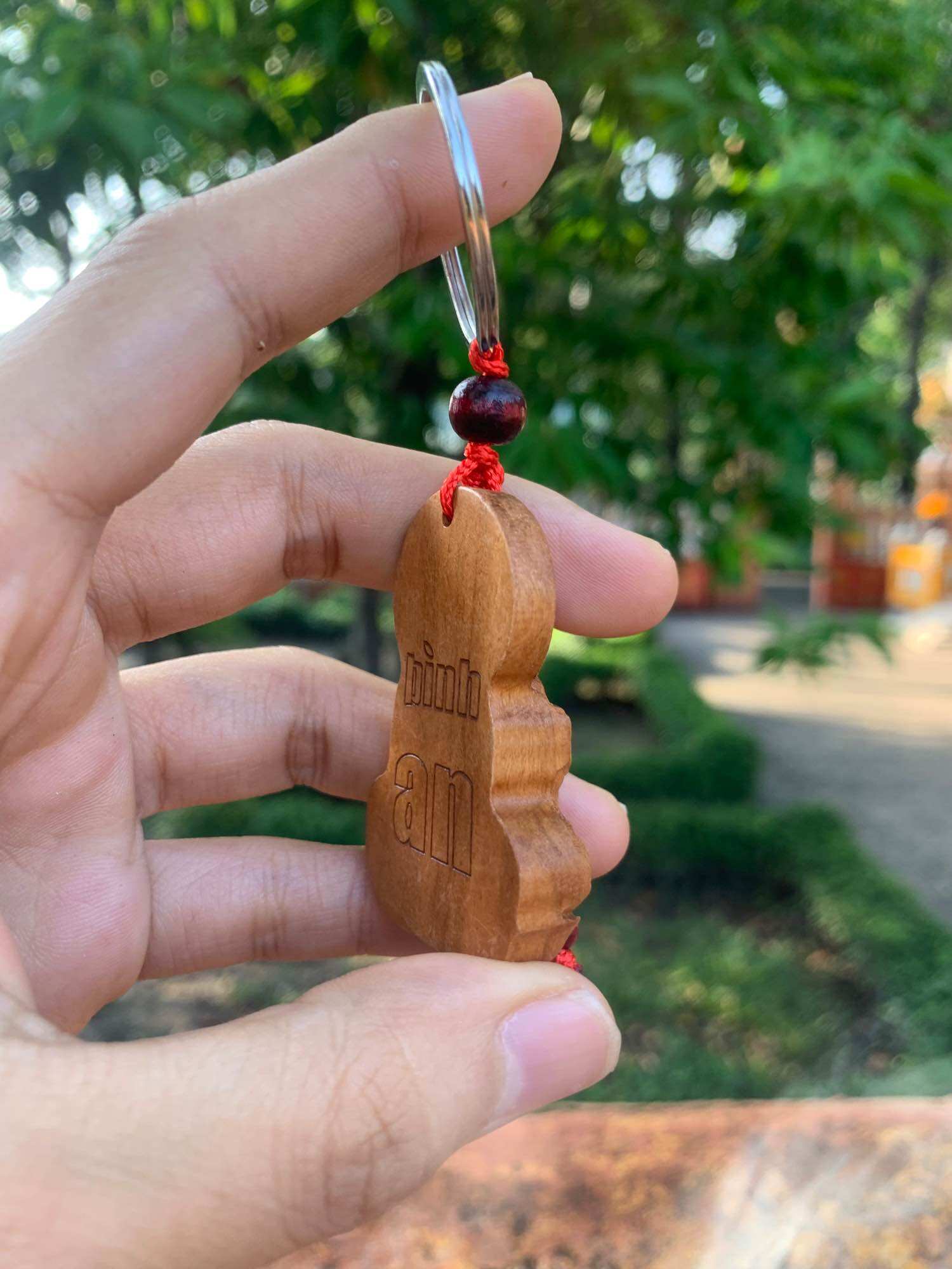 Móc khoá gỗ phật bà quan âm bình an size 5 cm
